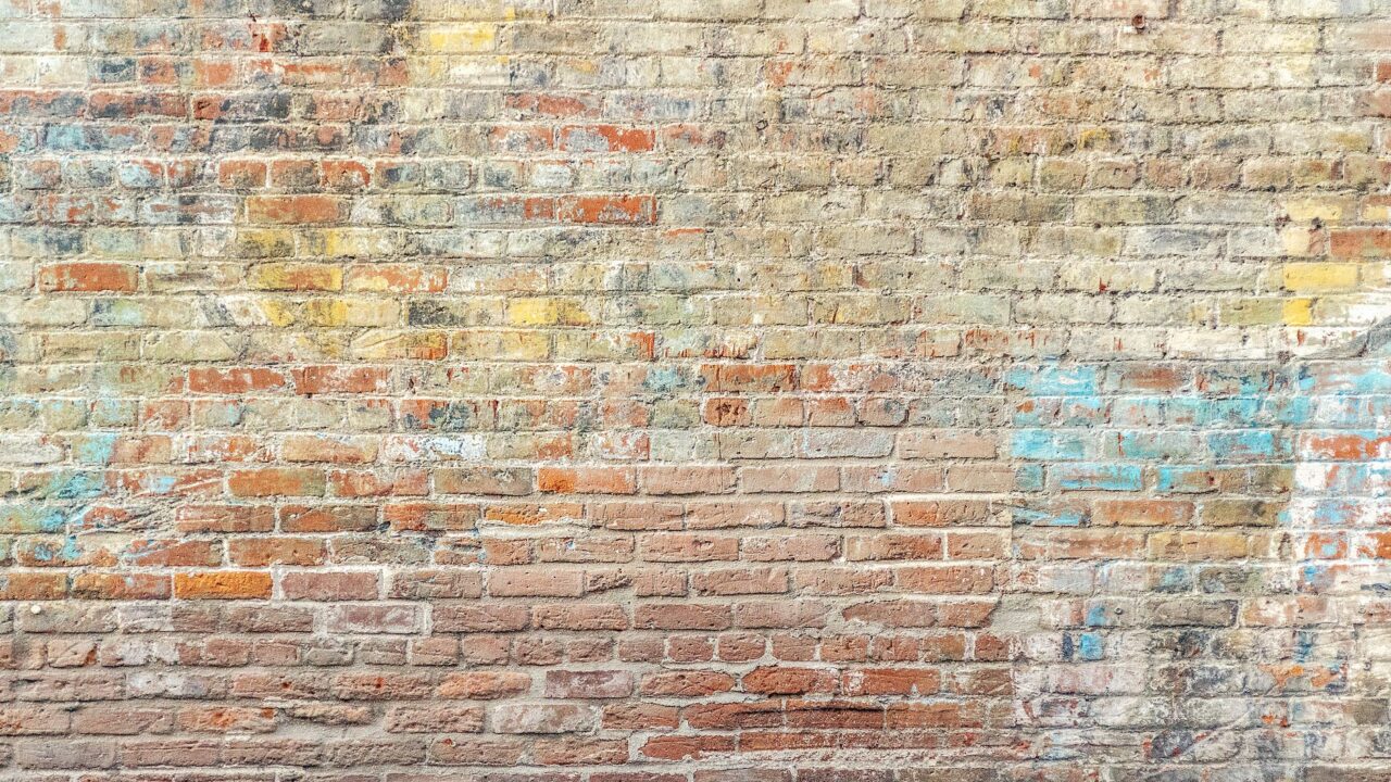 closeup photo of brown brick wall